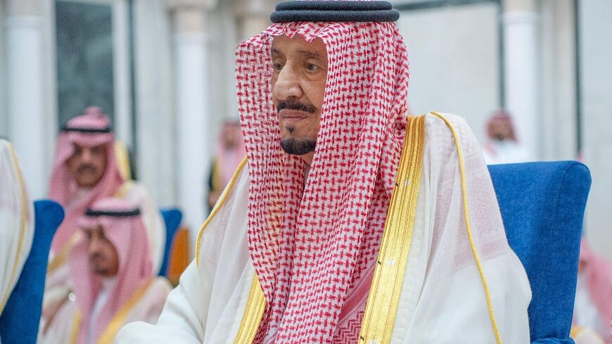 Saudi Arabia's ageing King Salman, seen here performing Eid Al-Fitr prayers on April 10, has been admitted to hospital for "routine examinations"