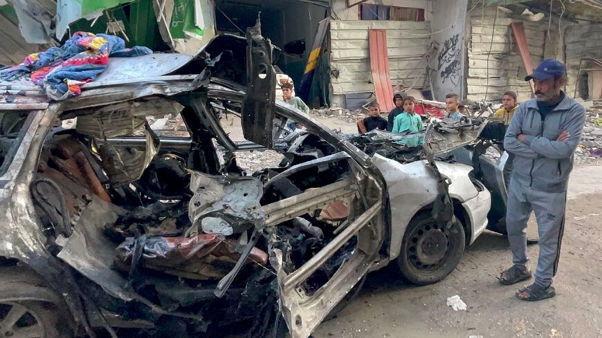 The remains of the car hit by an Israeli strike that Hamas leader Ismail Haniyeh says killed three of his sons on April 10 in Gaza