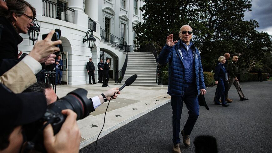 US President Joe Biden stops to speak to the press before boarding Marine One as he departs from the South Lawn of the White House on April 5, 2024. Biden is heading to Baltimore to tour the collapsed Francis Scott Key Bridge