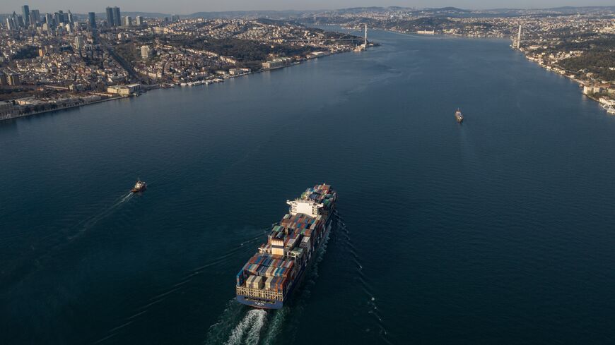 A cargo ship sails out into the Bosphorus, Istanbul, Turkey, April 19, 2020.