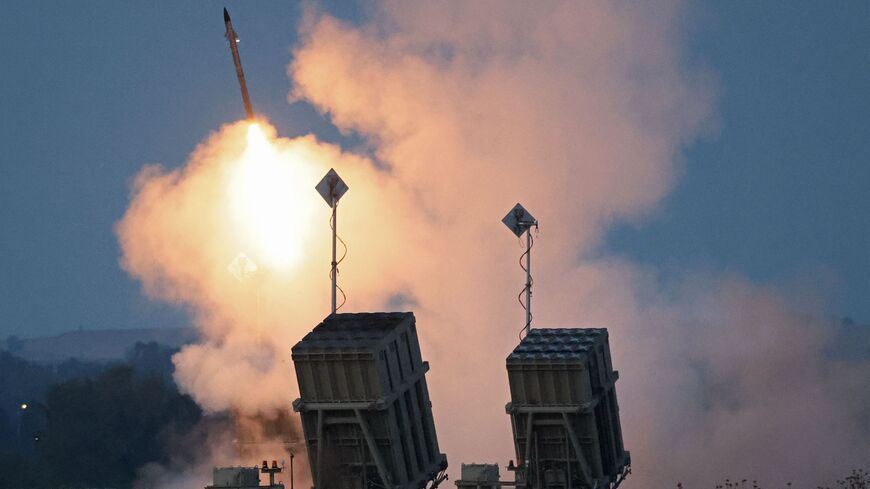 Israel's Iron Dome air defense system intercepts rockets launched from Gaza City, in Sderot on May 10, 2023. 