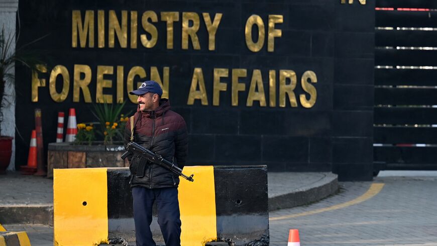 A Pakistani police officer stands guard outside the Ministry of Foreign Affairs in Islamabad on Jan. 18, 2024.