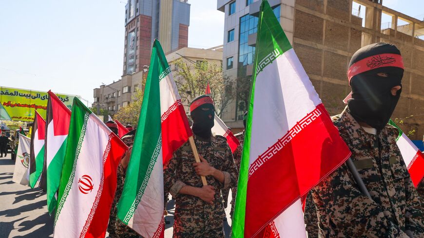 Iranian attend the funeral procession for seven Islamic Revolutionary Guard Corps members killed in a strike in Syria, which Iran blamed on Israel, in Tehran on April 5, 2024. 
