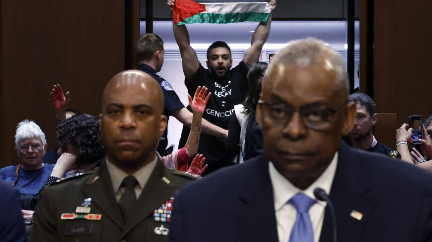 Protesters interrupt Secretary of Defense Lloyd Austin as he testifies before the Senate Armed Services Committee in the Hart Senate Office Building on Capitol Hill on April 09, 2024 in Washington, DC. Austin was testifying about the Biden Administration's FY2025 budget request for the Pentagon, which includes supplemental funding for Israel, Ukraine, Taiwan and other allies. (Photo by Chip Somodevilla/Getty Images)