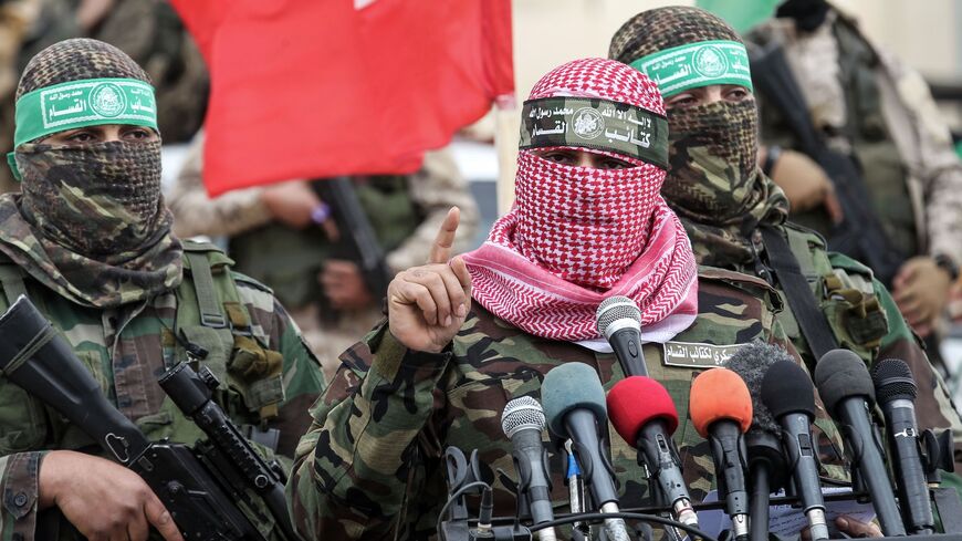 Abu Ubaida (C), spokesman of the Izz ad-Din al-Qassam Brigades.
