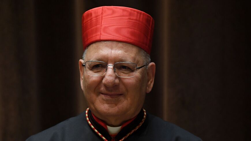 Louis Raphael I Sako of Iraq poses as he attends the courtesy visit of relatives following a consistory for the creation of new cardinals in the Apostolic Palace at St Peter's Basilica in the Vatican on June 28, 2018.
