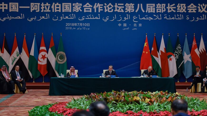 Arab League Secretary-General Ahmed Abul Gheit, China's Foreign Minister Wang Yi and Saudi Arabia's Foreign Minister Adel al-Jubeir attend the 8th Ministerial Meeting of China-Arab States Cooperation Forum at the Great Hall of the People in Beijing on July 10, 2018.