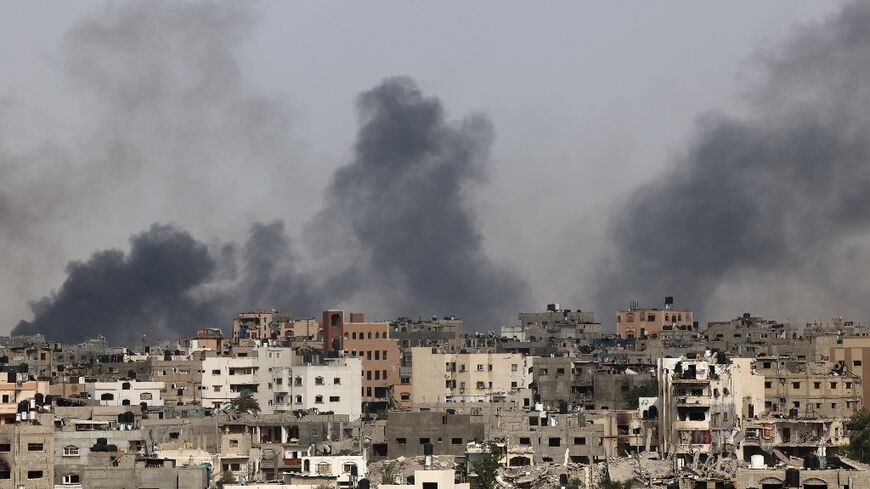 Smoke billows after an Israeli strike on Jabalia in the northern Gaza Strip 