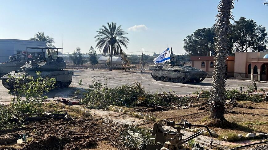An Israeli army pictures shows what it says are tanks from its 401st Brigade entering the Palestinian side of the Rafah border crossing with Egypt