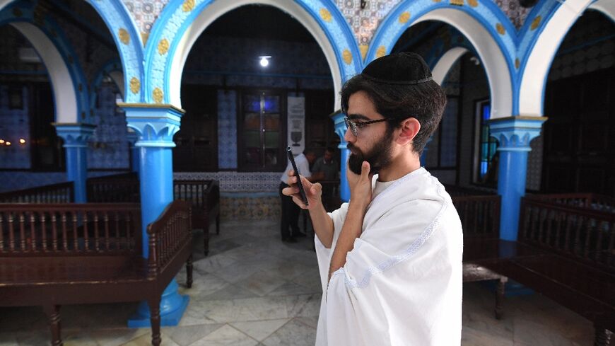 A French Jewish pilgrim visits the historic Ghriba synagogue on the Tunisian island of Djerba