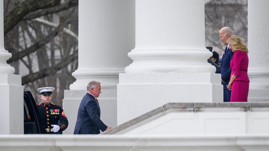 US President Joe Biden and First Lady Jill Biden greet Jordan's King Abdullah II. 