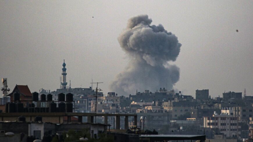 Smoke billows during Israeli bombardment in Rafah in the southern Gaza Strip on May 19, 2024