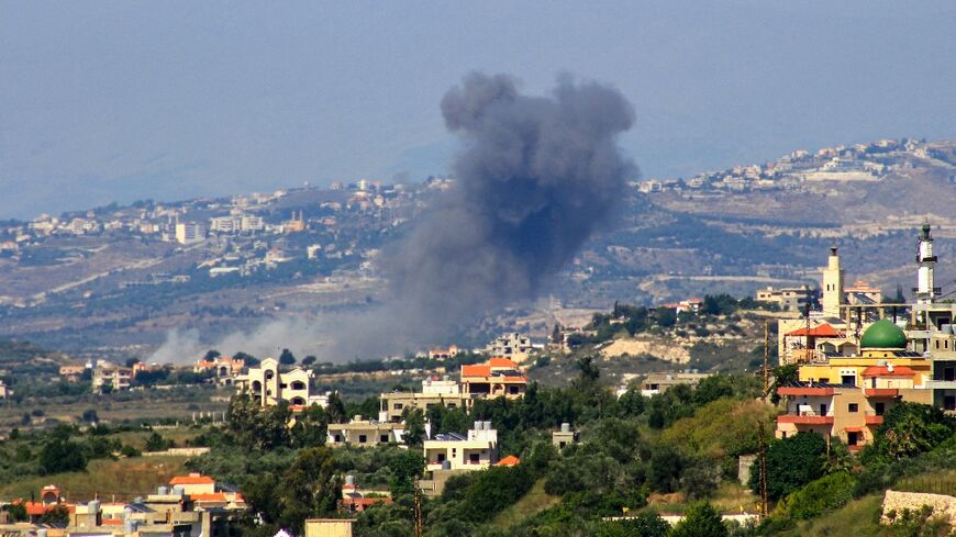 Smoke billows following an Israeli air strike on the south Lebanon town of Siddikine