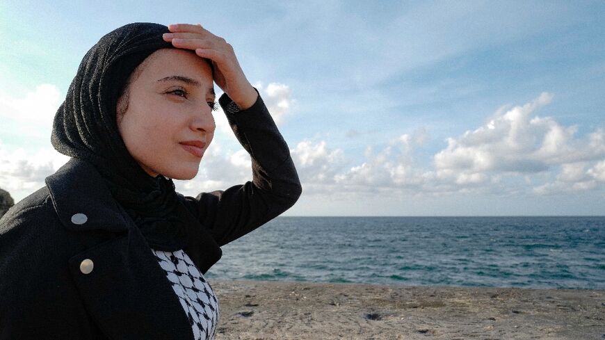 Samar Alghoul lives in a dorm with six other students at the University of Havana, but often dreams of returning to her family's side, even if it means running towards war