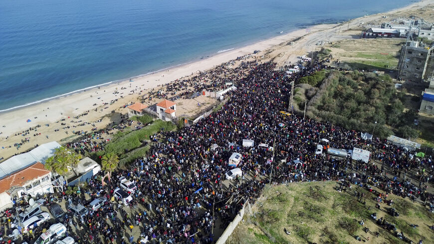 This aerial photo shows displaced Gazans gathering in an area in Nuseirat to return to their homes in the northern part of the Gaza Strip, Jan. 26, 2025.