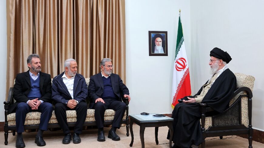 A picture released by Khamenei's office shows him meeting Islamic Jihad chief Ziyad al-Nakhalah (second left) in Tehran