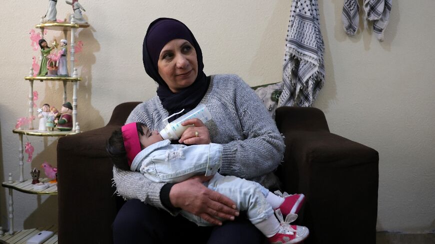 Iman Farhat said the idea for her and her husband to adopt a child 'was cemented by' Gaza's war