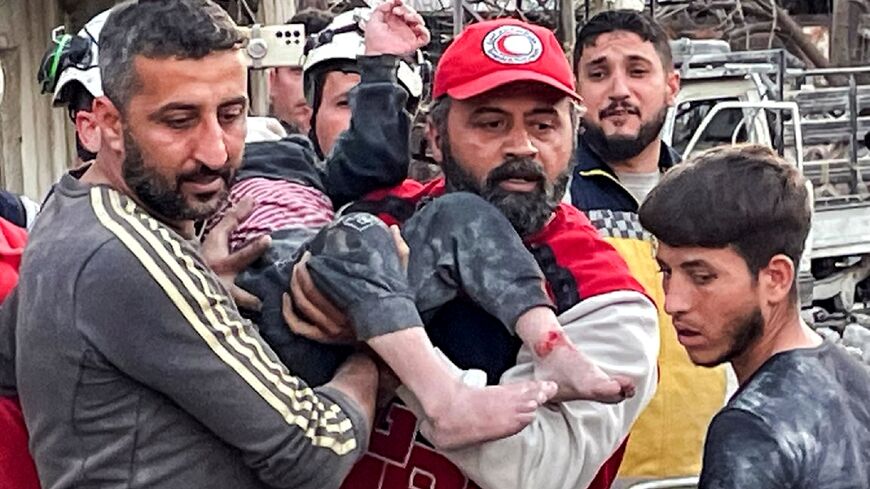 Rescue workers dug out people trapped after a building collapsed in an explosion 