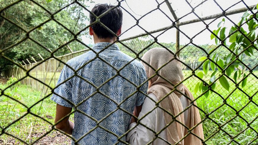 Mohammad Asadi and his wife Marwa fled Taliban rule in Afghanistan. After traveling halfway around the world to try to obtain asylum in the United States, they are in limbo at a Costa Rican migrant detention center