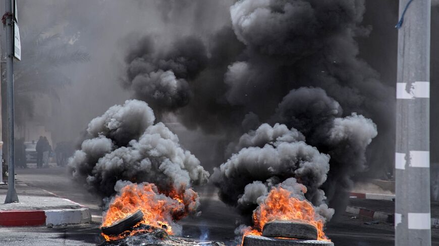 Angry residents block roads in the Tunisian town of Mezzouna after the deaths of three six-formers in a school wall collapse on Monday.