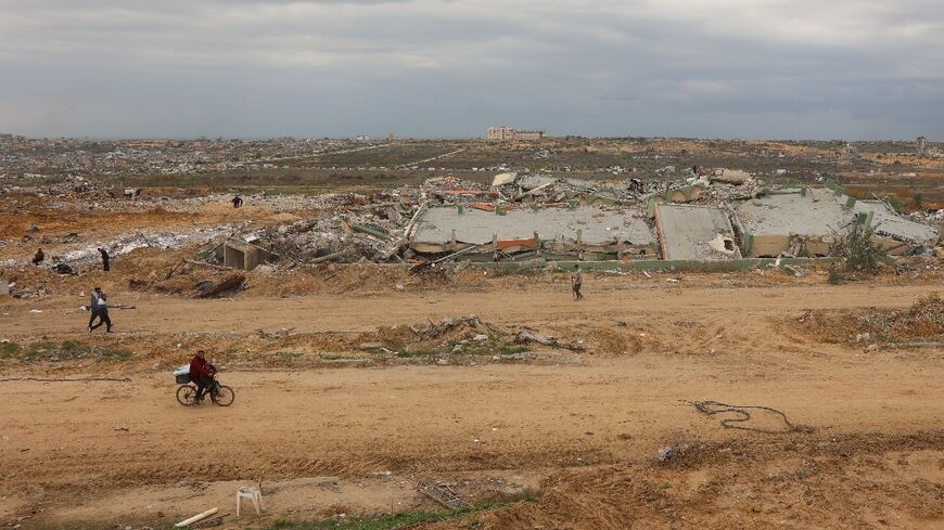 Displaced Palestinians crossing the so-called Netzarim corridor in the Gaza Strip on February 9, 2025