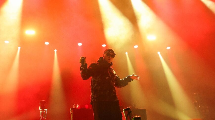 Mo Chara from Irish hip hop trio Kneecap onstage at the 2025 Coachella Valley