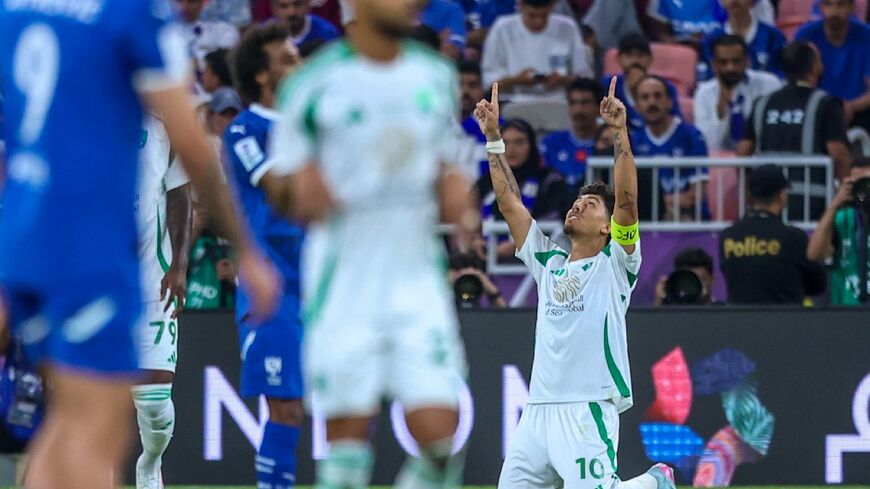 Roberto Firmino points to the sky after scoring Al Ahli's first goal in their Asian Champions League semi-final win against Al Hilal