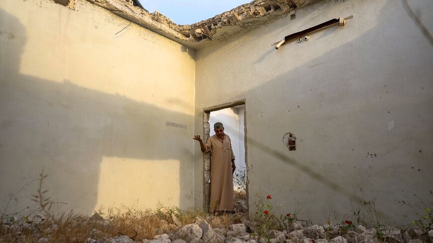 Aref Shamtan, 73: 'I feel good here, even among the rubble'