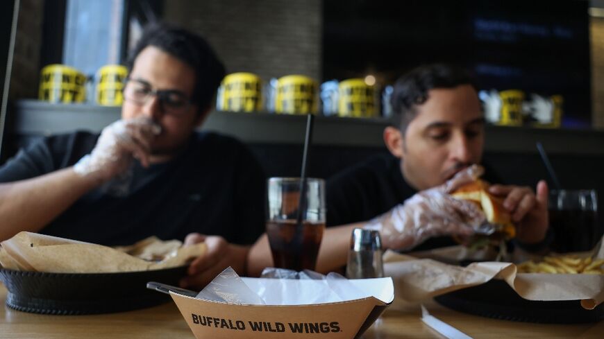 Saudis dig in at a Buffalo Wild Wings branch in Riyadh