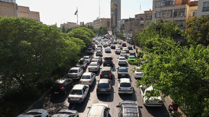 Traffic is jammed on a street in Tehran as people seek to leave the Iranian capital on June 15, 2025