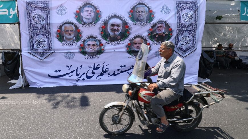 Portraits of Iranian military generals and nuclear scientists killed in Israel's attack early on June 13