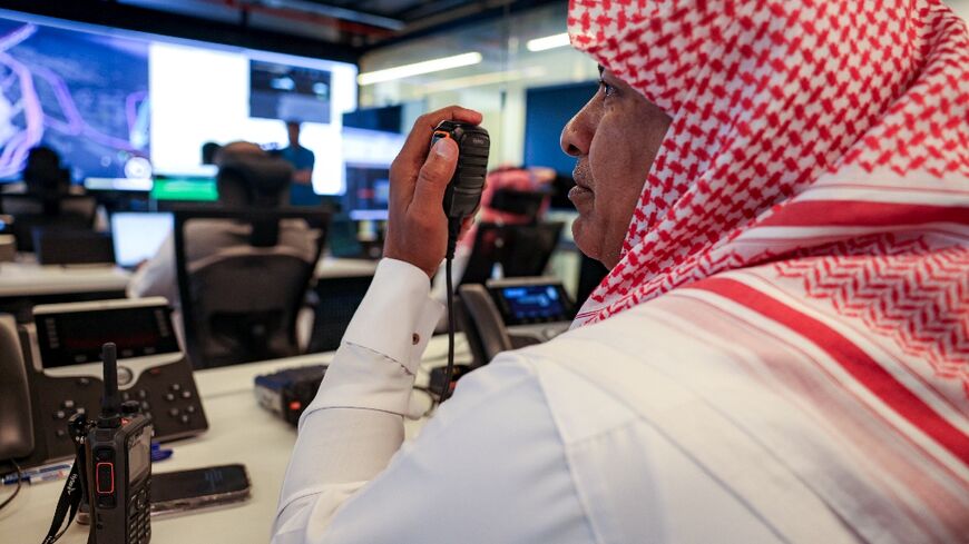 The hajj control room in Mecca is filled with screens and maps for round-the-clock monitoring