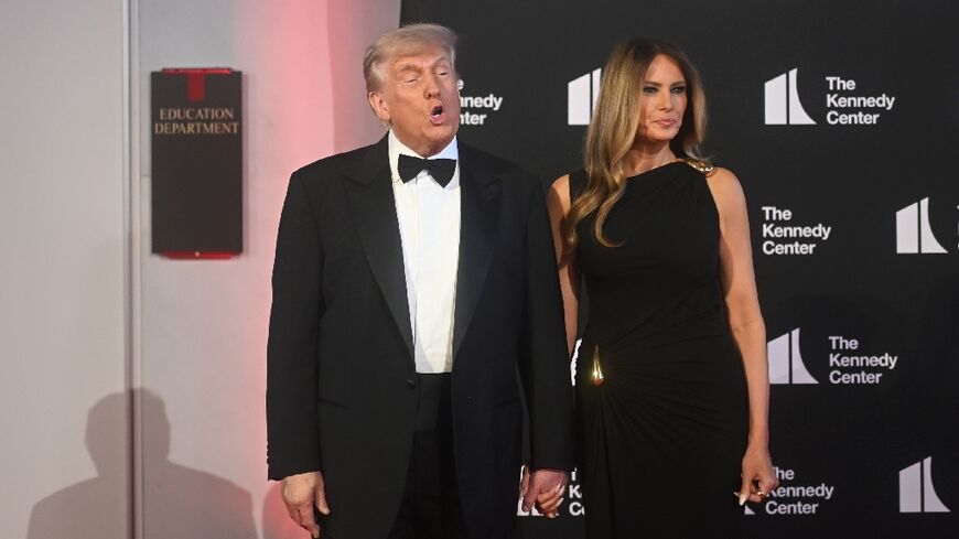 US President Donald Trump and First Lady Melania Trump arrive to attend the opening night of "Les Miserables" at the Kennedy Center in Washington, DC, on June 11, 2025.