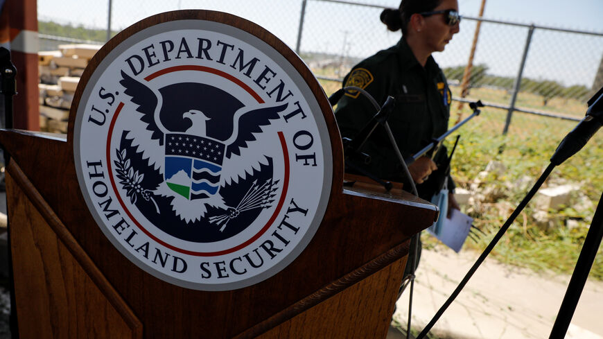 FILE PHOTO: The seal of the U.S. Department of Homeland Security is seen after a news conference in Del Rio, Texas, U.S., September 19, 2021. REUTERS/Marco Bello/File photo