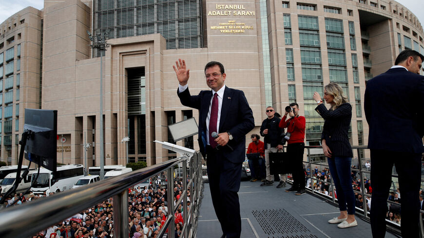 FILE PHOTO: Istanbul Mayor Ekrem Imamoglu, re-elected on Sunday, greets his supporters after receiving mayoral certificate in front of the Caglayan Courthouse in Istanbul, Turkey April 3, 2024. REUTERS/Dilara Senkaya/File Photo