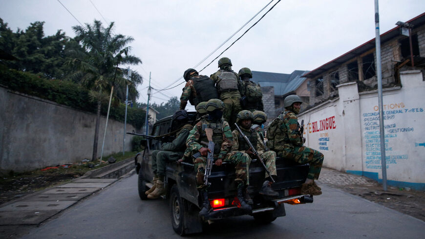 FILE PHOTO: Members of the M23 rebel group ride on a pickup truck as they leave their position for patrols amid conflict between them and the Armed Forces of the Democratic Republic of the Congo (FARDC), in Goma, eastern Democratic Republic of the Congo, January 29, 2025. REUTERS/Stringer/File Photo