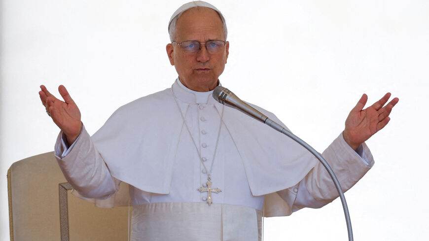 FILE PHOTO: Pope Leo XIV gestures on the day he holds a general audience in St. Peter's Square at the Vatican, May 28, 2025. REUTERS/Remo Casilli/File Photo