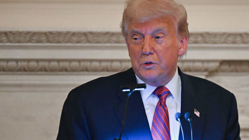FILE PHOTO: U.S. President Donald Trump speaks at a dinner with Republican Senators, in the State Dining Room at the White House in Washington, D.C., U.S., July 18, 2025. REUTERS/Annabelle Gordon/File Photo