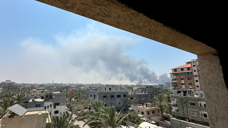 Smoke rises during Israeli strikes amid the Israeli military operation in Deir Al-Balah, in the central Gaza Strip, July 21, 2025. REUTERS/Hatem Khaled