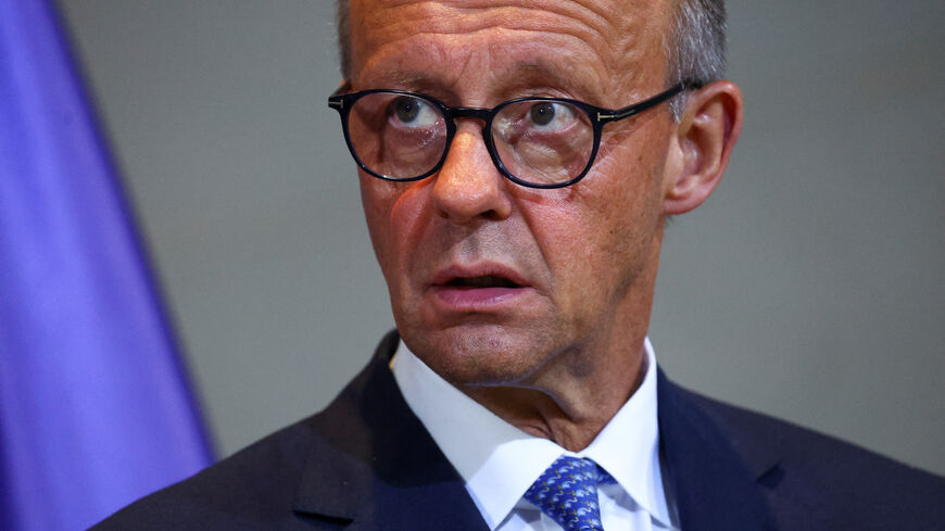 FILE PHOTO: German Chancellor Friedrich Merz addresses the media with Norway's Prime Minister Jonas Gahr Store (not pictured) at the Chancellery in Berlin, Germany, July 21, 2025.REUTERS/Lisi Niesner/File Photo