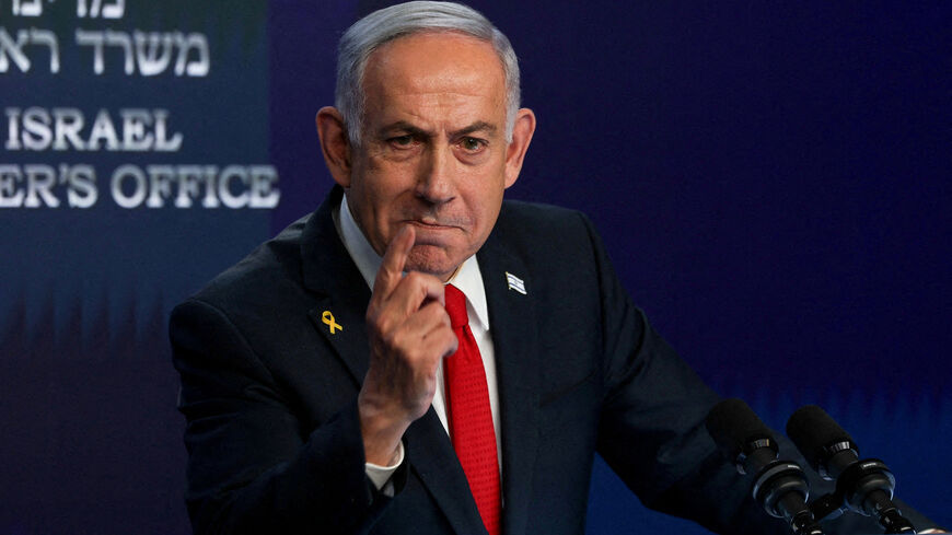 FILE PHOTO: Israeli Prime Minister Benjamin Netanyahu speaks during a press conference, in Jerusalem, May 21, 2025. REUTERS/Ronen Zvulun/Pool/File Photo