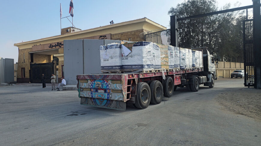 Truck carrying aid lines up near the Rafah border crossing between Egypt and the Gaza Strip, amid the ongoing conflict between Israel and Hamas, in Rafah, Egypt, July 28, 2025. REUTERS/Stringer