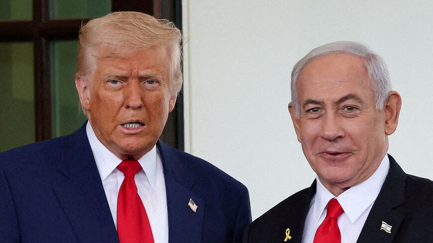 FILE PHOTO: U.S. President Donald Trump welcomes Israeli Prime Minister Benjamin Netanyahu at the entrance of the White House in Washington, D.C., U.S., April 7, 2025. REUTERS/Leah Millis/File Photo