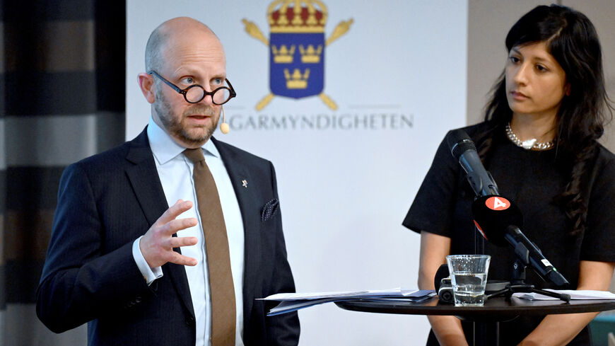 Henrik Olin, Deputy Chief Prosecutor at the National Unit for Security Cases, and Reena Devgun, Senior Prosecutor at the National Unit against International and Organized Crime, attend a press conference on 27 May 2025 in Stockholm, Sweden. The Swedish Prosecution Authority has indicted Swedish man Osama Krayem, 32, for gross war crimes and terrorism in Syria. TT News Agency/Jonas Ekstromer/via REUTERS/File Photo