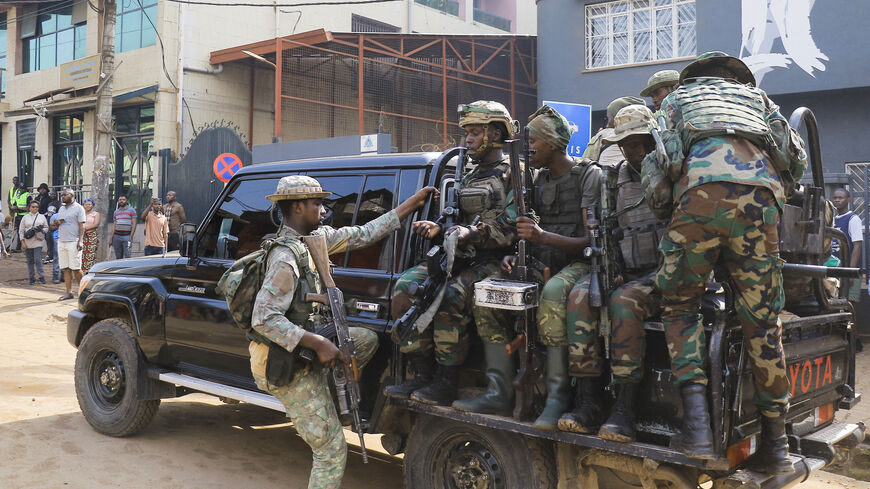 Members of the M23 rebel group gather on their pick-up truck after recovering guns during a community street cleaning exercise called Salongo, aimed at strengthening local solidarity conducted by members of the M23 rebels, following their takeover of Bukavu, eastern Democratic Republic of Congo, February 20, 2025. REUTERS/Victoire Mukenge/File Photo