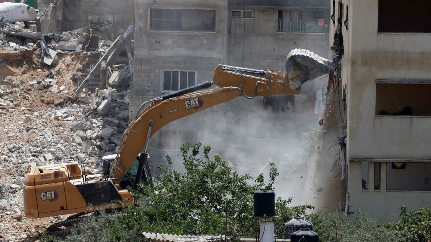 Homes were knocked down and wide avenues cleared