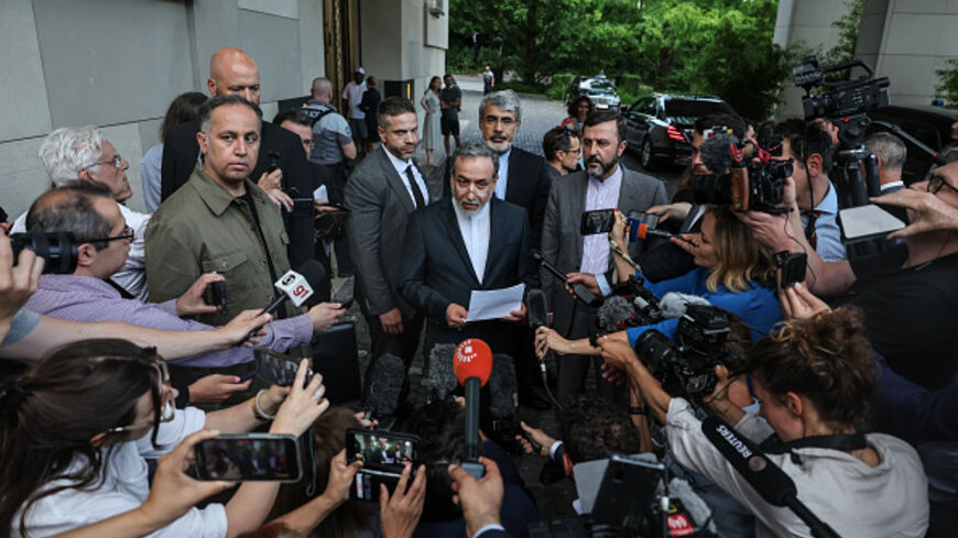 GENEVA, SWITZERLAND - JUNE 20: Iran's Foreign Minister Abbas Araghchi (C) speaks to the media after his meeting with the E3 group of European ministers on June 20, 2025 in Geneva, Switzerland. The European ministers have said they are seeking a diplomatic solution to avert the escalating war between Israel and Iran, in which US President Trump has threatened to intervene. Prior to meeting with the Iranians, the Europeans were also meeting with EU foreign policy chief Kaja Kallas. (Photo by Sedat Suna/Getty 