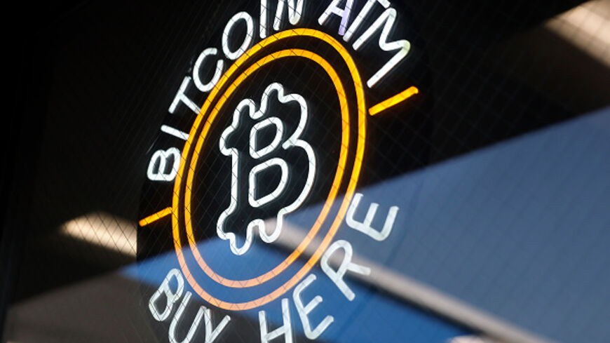 A sign advertises a Bitcoin ATM at a gas station on July 16, 2025 near Pasadena, California. (Mario Tama/Getty Images)