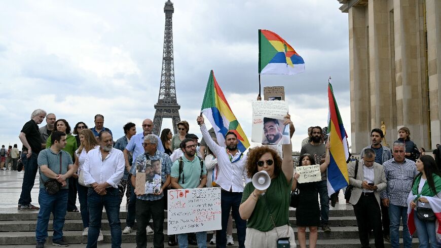 Two dozen protesters gathered in Paris