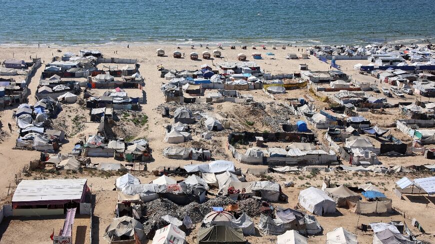 Tents and shelters for Palestinians displaced by the war in Gaza City